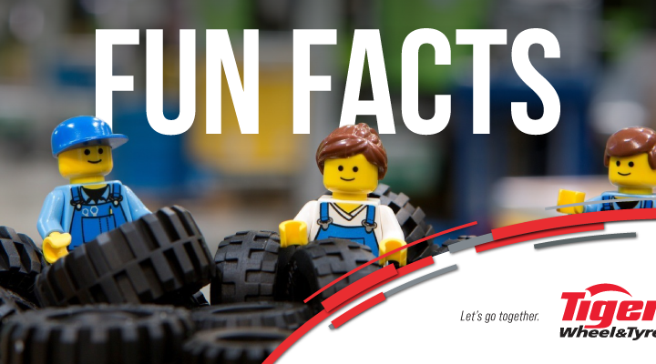 lego people standing amongst lego tyres