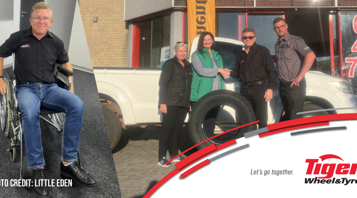 Alex Taplin in a wheel chair and shaking hands with people